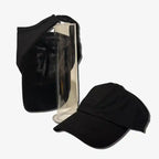 Black cap with a clear stand on a white background