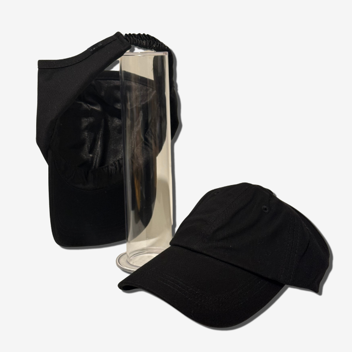 Black cap with a clear stand on a white background