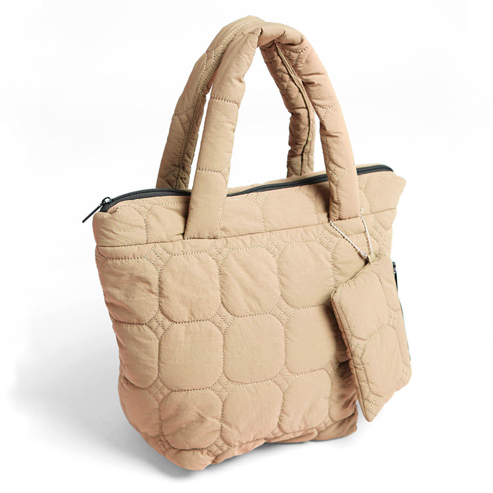 A beige quilted puffer tote bag with dual top handles and a matching zippered pouch.