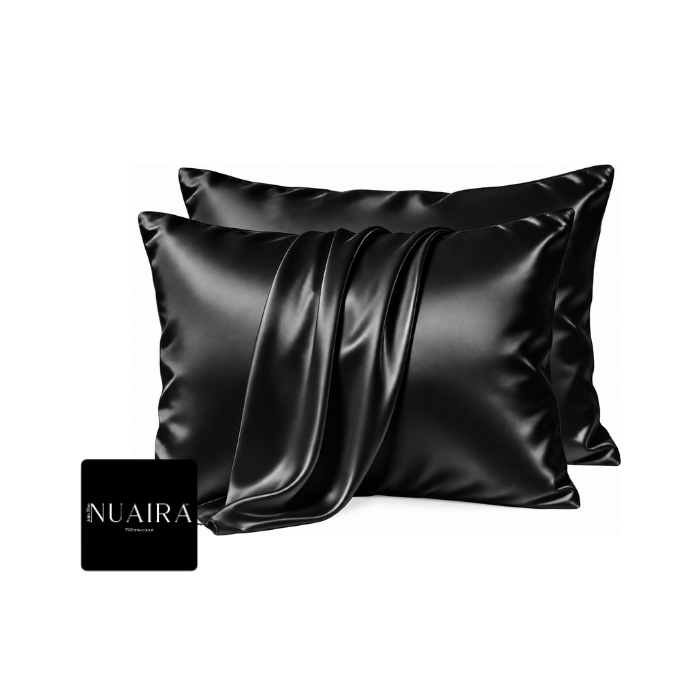 Two black satin pillowcases with a glossy, draped finish, by 'NUAIRA'