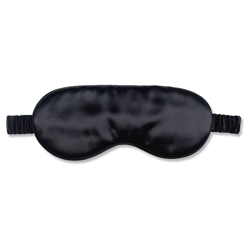 Luxurious, black silky-smooth eye mask. The soft padding lays effortlessly on your face, Perfect for travel, daytime naps.