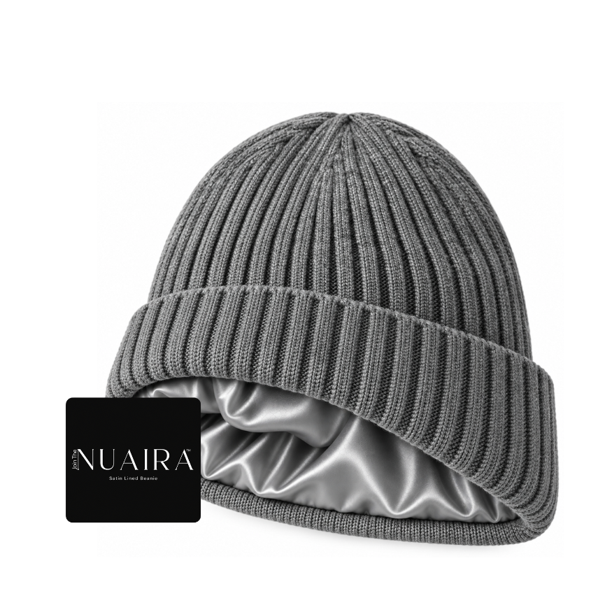 A grey ribbed knit beanie hat with a silvery satin inner lining classic cuff wool-like feel by NUAIRA 