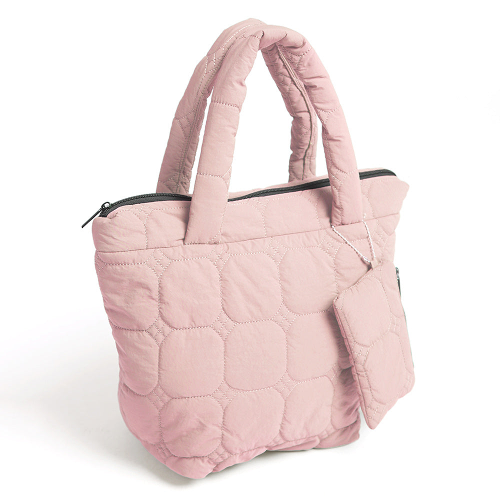 A light pink quilted puffer tote bag with dual top handles and a matching zippered pouch.