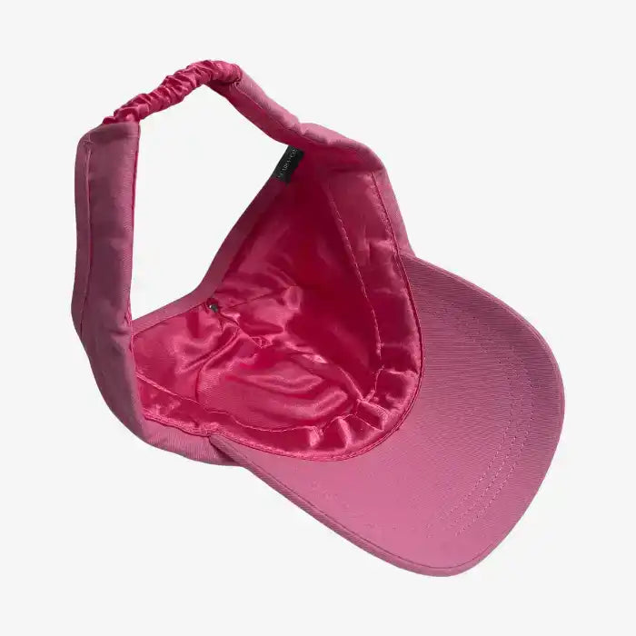 Pink satin-lined backless baseball cap with elastic strap, curl-friendly hat