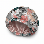 NuAira Pinky Poppie satin fabric swatch – pink flamingo and tropical leaf print for hair bonnet
