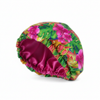 NuAira Tropical Floral satin fabric swatch – vibrant pink and green tropical flower print for hair bonnet